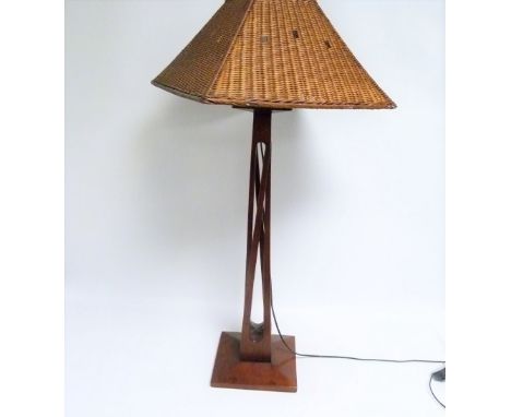 Arts &amp; Crafts style mahogany table lamp. Electrical testing / rewiring required. 77cm high, with basket weave shade.