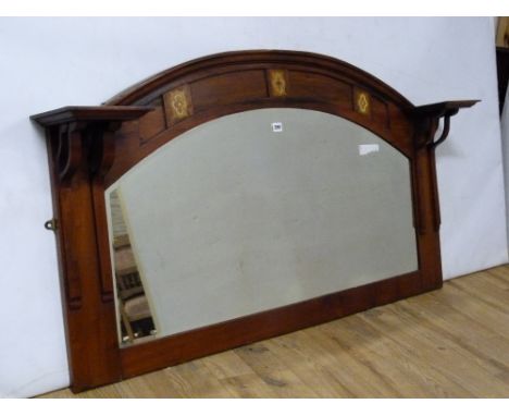 Arts &amp; Crafts style mahogany arch top overmantel mirror with inlaid tablets &amp; square bracket shelves. 139cm wide.