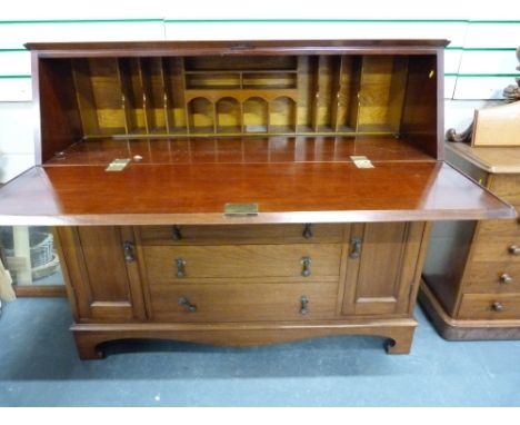 20th century North European mahogany bureau, the fall front opening to interior fitted with pigeonholes above four central dr