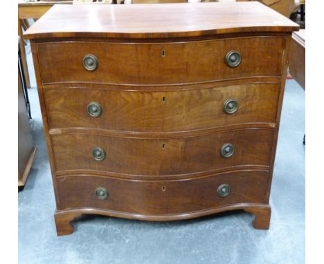 George III crossbanded mahogany serpentine front chest of four drawers on bracket feet. 97cm wide. Condition report:Splitting