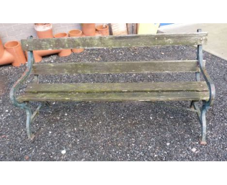 Early 20th century garden bench with cast iron ends. 180cm long