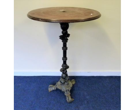 Pair of high circular bar tables, each on cast iron baluster columns &amp; tripod supports.
