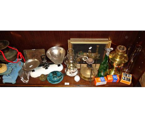 Two oil lamps, primus stove, kitchen scales, etched green glass decanter, etc.