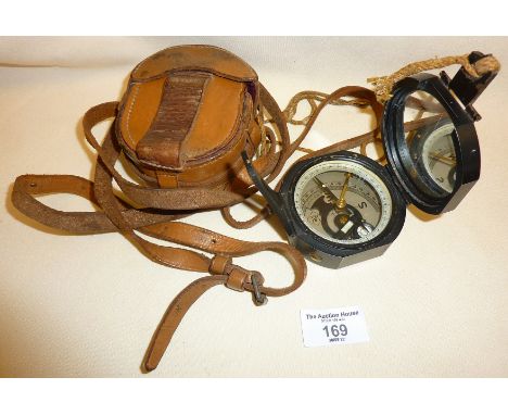 Black lacquered WW2 Army marching compass with leather case