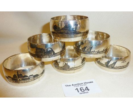 Iraqi silver napkin rings decorated with niello enamel scenes