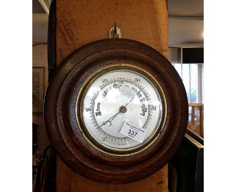 Oak framed round aneroid barometer