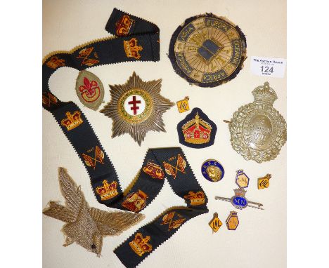 Interesting collection of military and other enamel badges, inc. a heavy continental silver and enamel helmet badge with the 