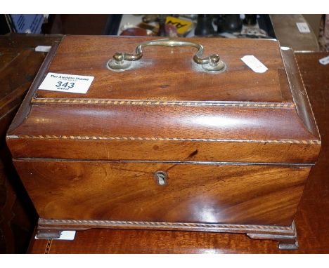 Victorian flame mahogany tea caddy with brass handle to top on bracket feet