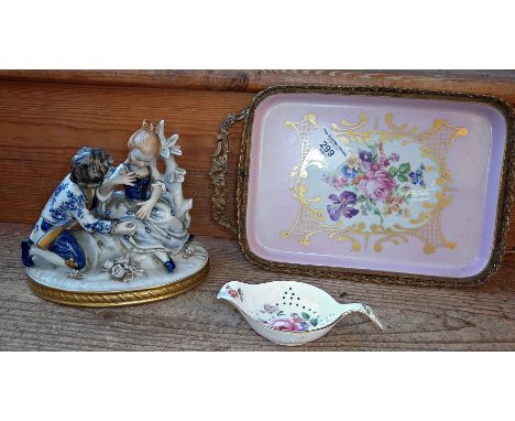 Royal Crown Derby "Derby Posies" tea strainer, a Naples porcelain group and a Limoges porcelain tray with gilded metal galler