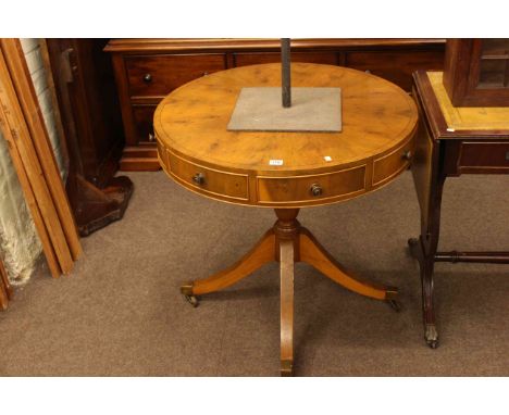 Yew three drawer pedestal drum table.