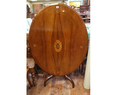 Victorian inlaid walnut oval breakfast table on turned pedestal tripod base (table top 115cm by 86cm).