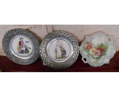 A pair of pewter mounted ceramic plates with Kate Greenaway decoration - sold with another
