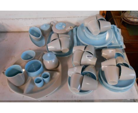 A quantity of Poole Pottery tableware in the sky blue and seagull colourway including teapot, milk jug, hors d`oeuvres dish, 
