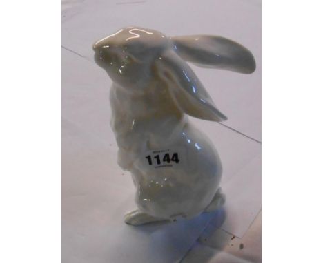 A Noritake bone china white glazed figurine depicting a rabbit on its hind legs