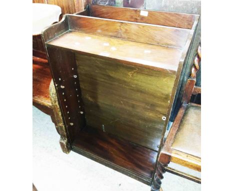 A pair of 61cm 1930's walnut two shelf adjustable open bookcases, set on plinth bases