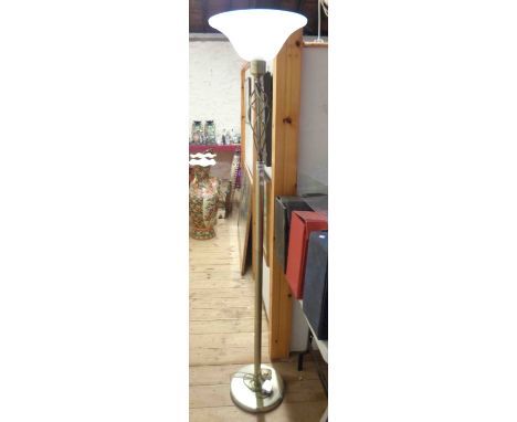 A modern torchere style up lighter with twist pattern and opaque shade