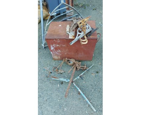 A red painted metal toolbox - sold with a quantity of metal brackets, etc.