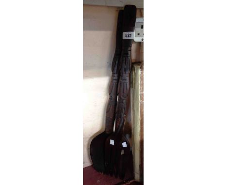 A pair of novelty carved wood oversized wall decorations of fork and spoon form