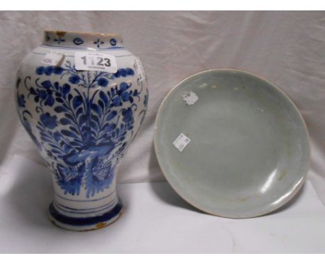 An antique Delftware jar of baluster form with blue painted decoration depicting birds amidst foliage - sold with a Chinese C