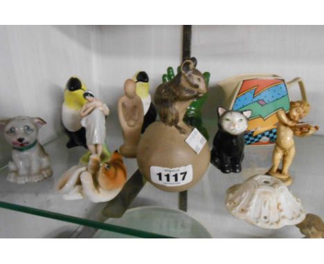 A quantity of ceramic figurines and other ceramic items including Poole Pottery figurine of a mouse seated on an apple, Rosen