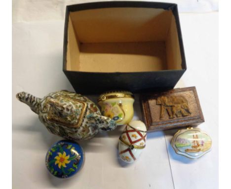 A box containing a small quantity of collectable items including enamelled elephant form teapot, porcelain trinket boxes, etc