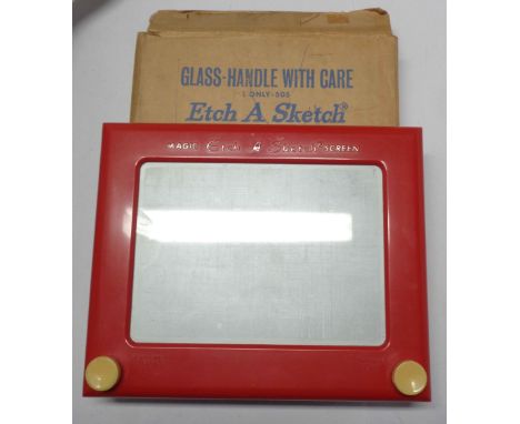 A vintage Etch-a-Sketch in original box