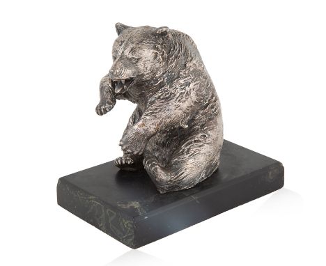 A RUSSIAN-IMPORTED SILVER MODEL OF A BEAR, LATE 19TH-EARLY 20TH CENTURYmodelled in a seated position with extended paws and f