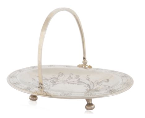 A RUSSIAN SILVER CAKE BASKET, 20TH CENTURY of oval form, with lifted edges, a continuous floral and foliate motif. the handle