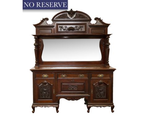 AN EASTERN EUROPEAN CARVED WALNUT MIRRORED-BACK DRESSER, LATE 19TH CENTURY late 19th century eastern european carved walnut m