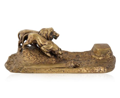 A BRONZE INKWELL AND LETTER OPENER BY FRIEDRICH GORNIK (AUSTRIAN 1877-1943), 1895-1925 the inkwell formed as a lion and lione