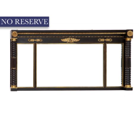 A FRENCH EMPIRE-STYLE ORMOLU-MOUNTED EBONIZED OVER-MANTLE MIRROR, 19TH CENTURY three-panel, flanked by a pair of gadrooned co