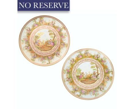 A PAIR OF GERMAN-AUSTRIAN PORCELAIN CHARGER PLATES, SCHUTZ CILLI (1854-1917), EARLY 20TH CENTURYeach of circular form with sl