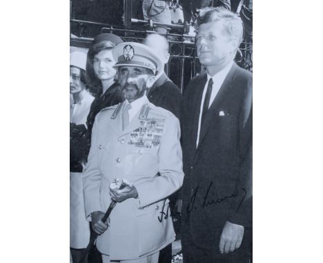 [JFK] A SIGNED VINTAGE PHOTOGRAPH OF JACKIE AND JOHN F. KENNEDY AND HAILE SELASSIE, 1963black-and-white print, signed by John