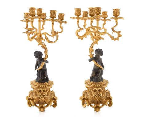 A PAIR OF FRENCH LOUIS XV STYLE ORMOLU CANDELABRA, 19TH CENTURY a pair of french ormolu and figural six-light candlelabra fea