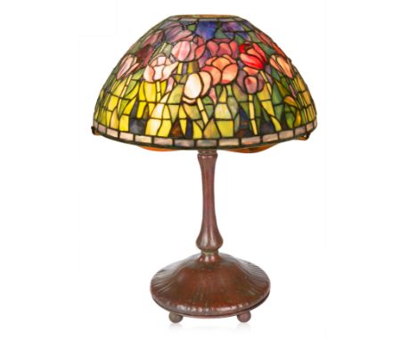 A MODERN TIFFANY STYLE 'PEONY' TABLE LAMP leaded glass and bronze, on a tiffany base with ball feet, stamped TIFFANY STUDIOS 