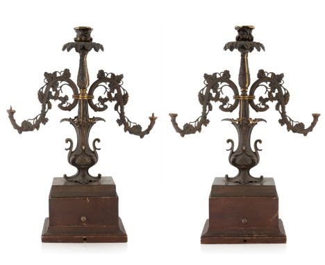 A PAIR OF BRONZE CANDELABRAS, LATE 19TH CENTURY three light candelabras, the arms formed from a continuous grapevine, the cen