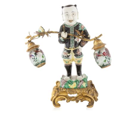 A CHINESE PORCELAIN WIRED LAMP ON A ORMOLU BASE, QING DYNASTY, LATE 19TH-EARLY 20THa chinese porcelain, with converted base, 