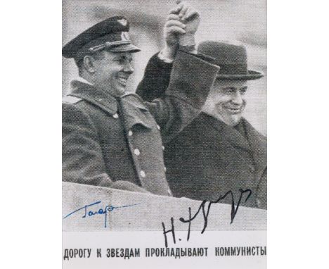 A VINTAGE SIGNED PHOTOGRAPH OF YURI GAGARIAN AND NIKITA KHRUSHCHEV black-and-white print, featuring Yuri Gagarin and Nikita K
