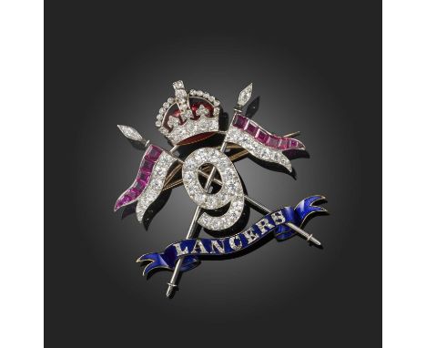 A fine ruby, sapphire, enamel and diamond regimental brooch, circa 1930, designed as the insignia of the 9th Lancers Regiment