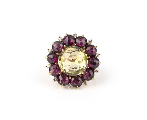 A multi-gem-set dress ring, set with a central faceted yellow quartz within rubellite and diamond border in yellow gold, size