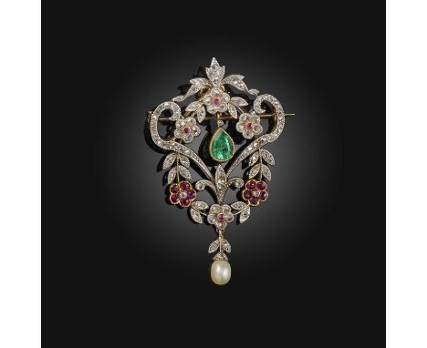 An Edwardian ruby, emerald, pearl and diamond brooch, circa 1910, of floral scroll design, set with rose-cut diamonds and cir