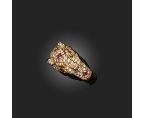 A ruby, emerald and diamond ring, designed as a big cat, pavé-set with brilliant-cut diamonds and step-cut rubies, its eyes s