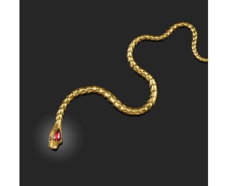 A Victorian gold and garnet necklace, mid 19th century, designed as a snake biting its own tail, its head engraved with a sca