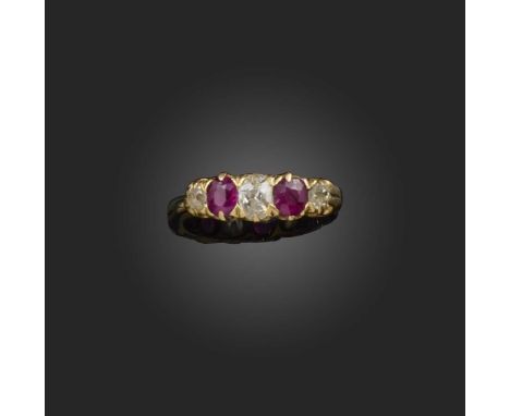 A ruby and diamond five-stone ring, late 19th century, set with three cushion-shaped diamonds and two oval rubies, mounted in