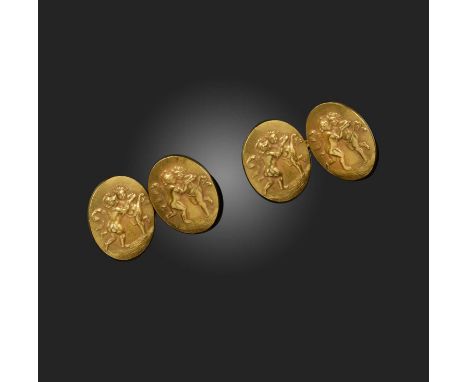 Tiffany &amp; Co., a pair of gold cufflinks, circa 1900, each end of oval outline, with a design of putti dancing among flowi
