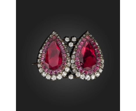 A garnet and diamond brooch, George III and later, the pear-shaped garnets within garnet surround in closed back silver and g