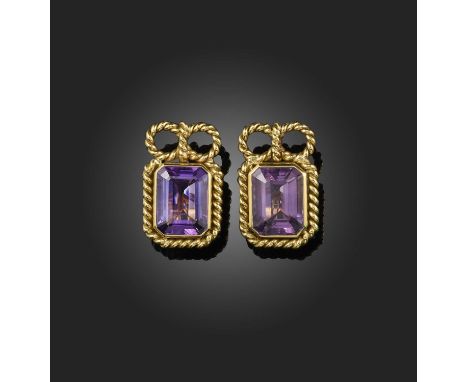 No reserve - a pair of gold and amethyst ear clips, each set with a step-cut amethyst within gold rope twist borders, surmoun