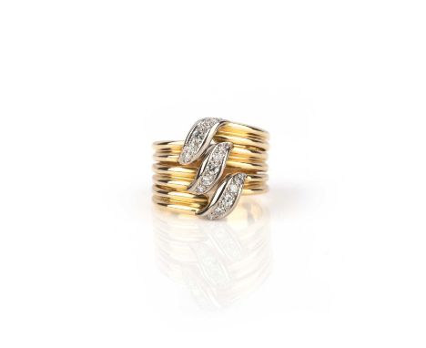 Cartier, a gold and diamond ring, of asymmetrical design, composed of three fluted gold bands connected by cascades of brilli