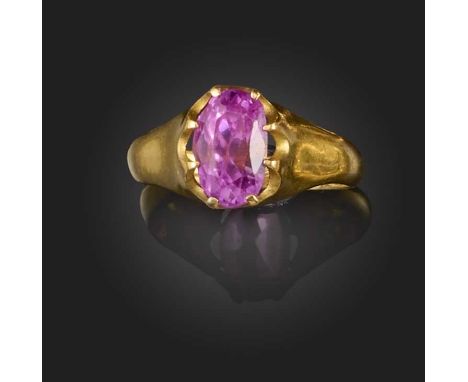 A pink sapphire ring, claw-set with an oval sapphire weighing approximately 3.00 carats, mounted in gold, size P