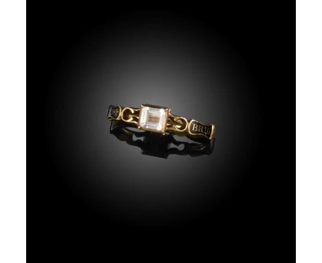 A rock crystal and enamel mourning ring, circa 1734, centring on a step-cut rock crystal enclosing a lock of hair, to openwor